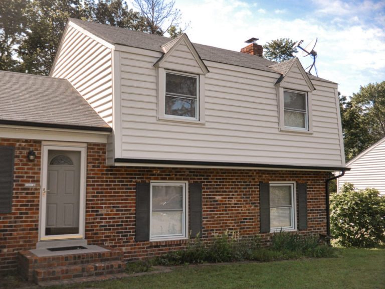 Before and After photos of a siding project on a Gambrel roof in Midlothian. RBM Remodeling